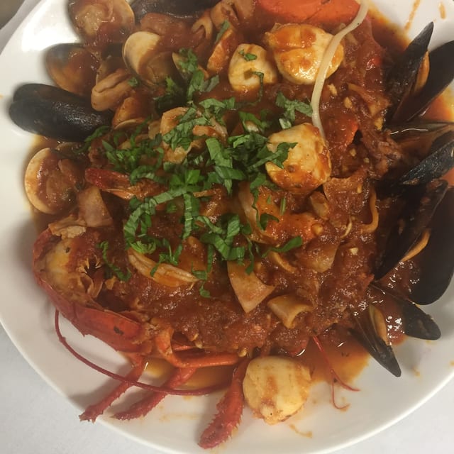 Zuppe Di Pesce Over Linguine.