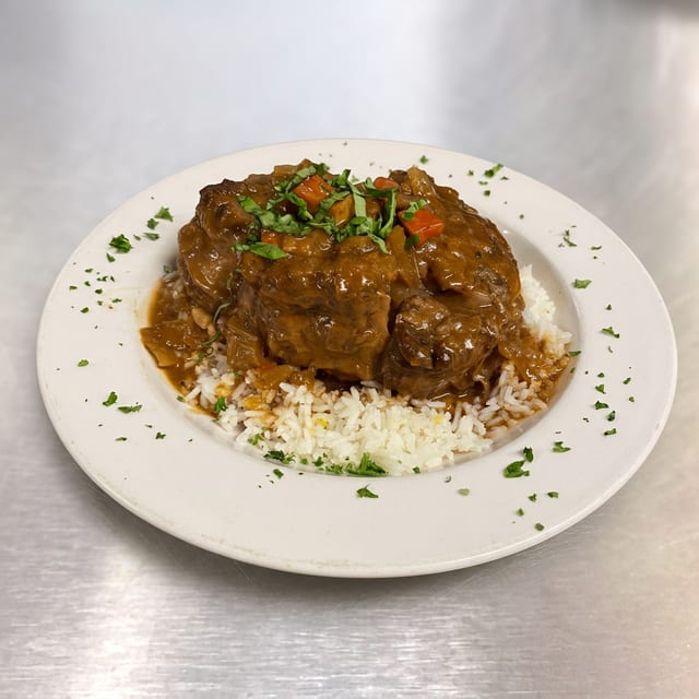 Veal Osso Buco Over Rice.
